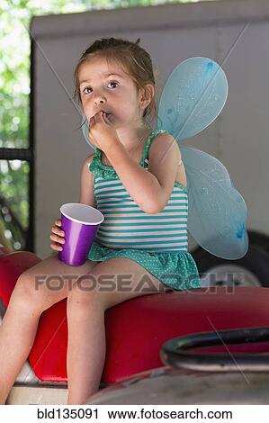 Caucasian girl playing dress up View Large Photo Image Stock Image - Caucasian girl playing dress up. Fotosearch