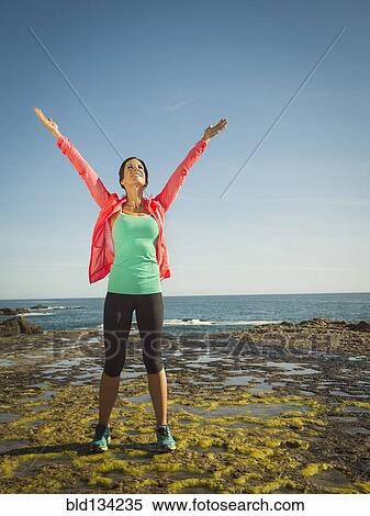 Caucasian runner stretching on beach View Large Photo Image Stock Photography - Caucasian runner stretching on beach. Fotosearch