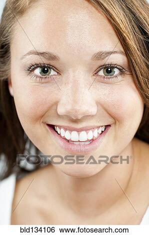 Caucasian woman smiling View Large Photo Image Stock Photograph - Caucasian woman smiling. Fotosearch