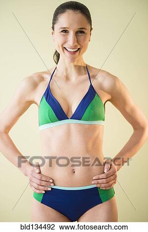 Caucasian woman wearing bikini View Large Photo Image Stock Image - Caucasian woman wearing bikini. Fotosearch