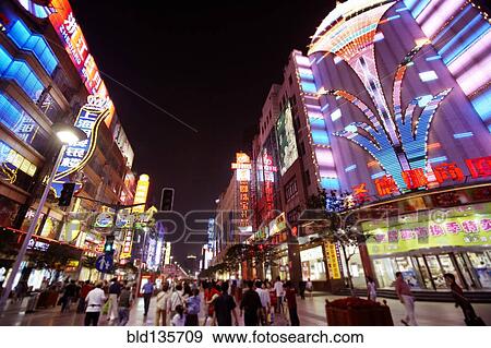 City street lit up at night, Shanghai, China View Large Photo Image Stock Photo - City street lit up at night, Shanghai, China. Fotosearch