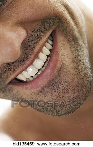 Stock Photo - Close up of man's smile. Fotosearch