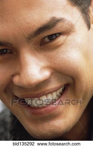 Close up of man's smiling face View Large Photo Image Stock Image - Close up of man's smiling face. Fotosearch