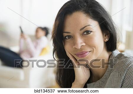 Close up of woman smiling View Large Photo Image Stock Photo - Close up of woman smiling. Fotosearch