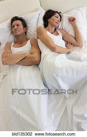 Couple arguing in bed View Large Photo Image Stock Image - Couple arguing in bed. Fotosearch