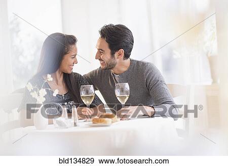 Couple having dinner together in restaurant View Large Photo Image Stock Photo - Couple having dinner together in restaurant. Fotosearch