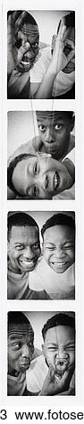 Father and son smiling in photo booth picture View Large Photo Image Stock Image - Father and son smiling in photo booth picture. Fotosearch