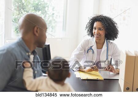 Father with baby talking to doctor View Large Photo Image Stock Photography - Father with baby talking to doctor. Fotosearch