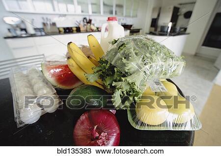 Fresh produce, milk and eggs on kitchen table View Large Photo Image Stock Image - Fresh produce, milk and eggs on kitchen table. Fotosearch