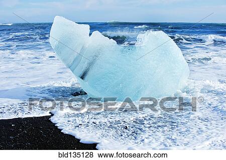 Glacier melting on arctic beach View Large Photo Image Stock Photo - Glacier melting on arctic beach. Fotosearch