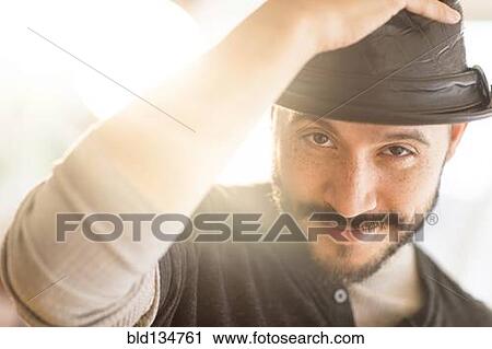 Hispanic man tipping his hat View Large Photo Image Stock Image - Hispanic man tipping his hat. Fotosearch
