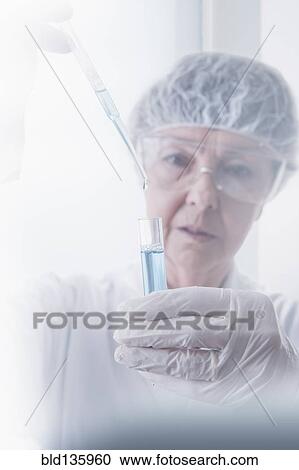 Hispanic scientist working in lab View Large Photo Image Stock Image - Hispanic scientist working in lab. Fotosearch
