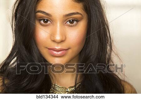 Picture - Hispanic woman smiling. Fotosearch