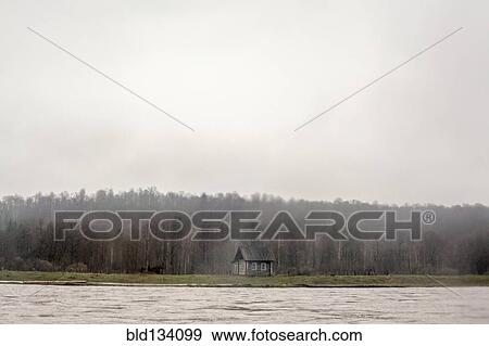 House built by rural river View Large Photo Image Stock Photo - House built by rural river. Fotosearch