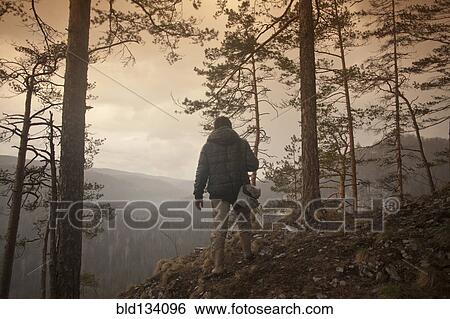 Mari man overlooking rural landscape View Large Photo Image Stock Photograph - Mari man overlooking rural landscape. Fotosearch