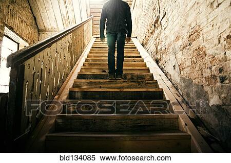 Mari man standing on staircase View Large Photo Image Stock Photography - Mari man standing on staircase. Fotosearch