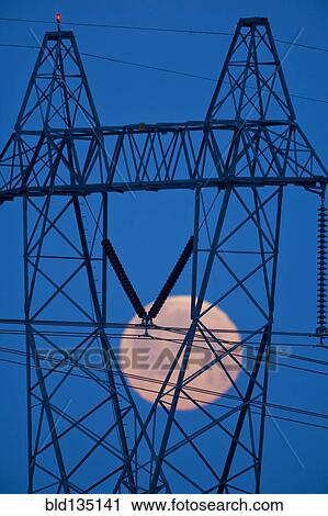 Moon viewed through power lines View Large Photo Image Stock Image - Moon viewed through power lines. Fotosearch