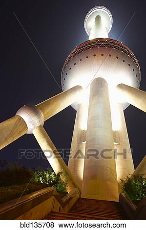 Oriental Pearl Tower lit up at night, Shanghai, China View Large Photo Image Stock Photo - Oriental Pearl Tower lit up at night, Shanghai, China. Fotosearch