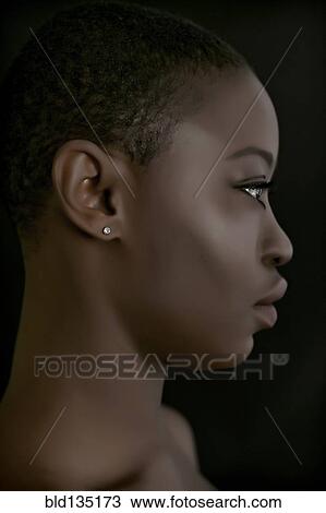 Stock Image - Profile of black woman . Fotosearch