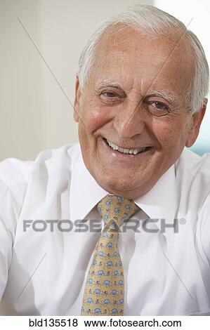 Stock Photo - Senior businessman smiling. Fotosearch