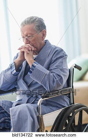 Senior Caucasian man sitting in wheelchair View Large Photo Image Stock Image - Senior Caucasian man sitting in wheelchair. Fotosearch