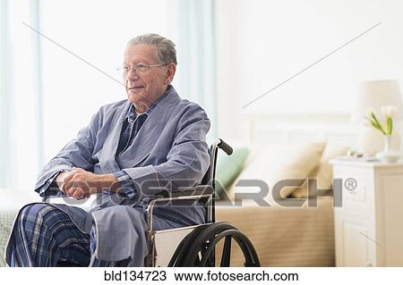 Senior Caucasian man sitting in wheelchair View Large Photo Image Stock Image - Senior Caucasian man sitting in wheelchair. Fotosearch