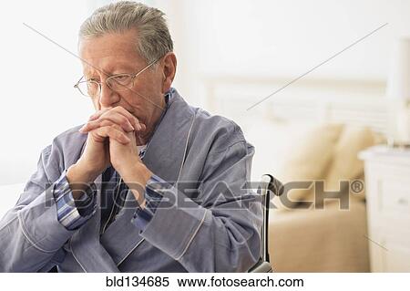 Senior Caucasian man sitting in wheelchair View Large Photo Image Stock Photography - Senior Caucasian man sitting in wheelchair. Fotosearch