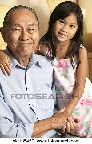 Senior man and granddaughter holding hands View Large Photo Image Stock Image - Senior man and granddaughter holding hands. Fotosearch