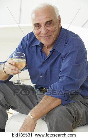 Senior man drinking glass of wine View Large Photo Image Stock Image - Senior man drinking glass of wine. Fotosearch