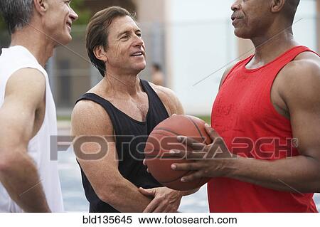 Senior men relaxing on court View Large Photo Image Stock Photography - Senior men relaxing on court. Fotosearch