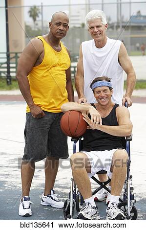 Senior men smiling on basketball court View Large Photo Image Stock Image - Senior men smiling on basketball court. Fotosearch