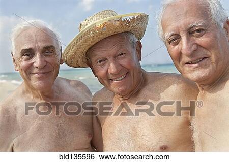 Senior men smiling on beach View Large Photo Image Stock Photograph - Senior men smiling on beach. Fotosearch