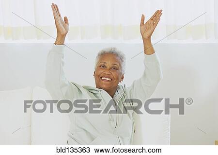 Senior woman clapping her hands View Large Photo Image Stock Image - Senior woman clapping her hands. Fotosearch