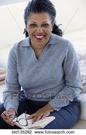 Senior woman reading View Large Photo Image Stock Image - Senior woman reading. Fotosearch