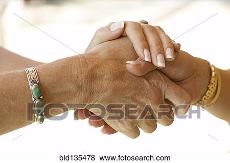 Senior women holding hands View Large Photo Image Stock Photo - Senior women holding hands. Fotosearch