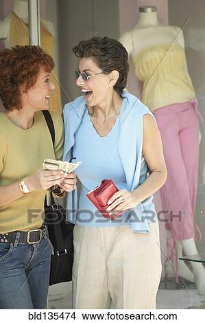 Senior women shopping together in store View Large Photo Image Picture - Senior women shopping together in store. Fotosearch