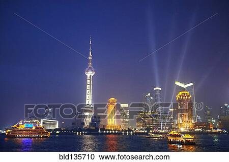 Shanghai city skyline lit up at night, Shanghai, China View Large Photo Image Stock Image - Shanghai city skyline lit up at night, Shanghai, China. Fotosearch