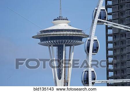 Space Needle overlooking Ferris wheel, Seattle, Washington, USA View Large Photo Image Stock Image - Space Needle overlooking Ferris wheel, Seattle, Washington, USA. Fotosearch