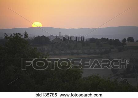 Sun setting over rural landscape, Lugano, Ticino, Switzerland View Large Photo Image Stock Photography - Sun setting over rural landscape, Lugano, Ticino, Switzerland. Fotosearch