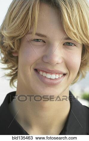 Teenage boy smiling View Large Photo Image Stock Image - Teenage boy smiling. Fotosearch
