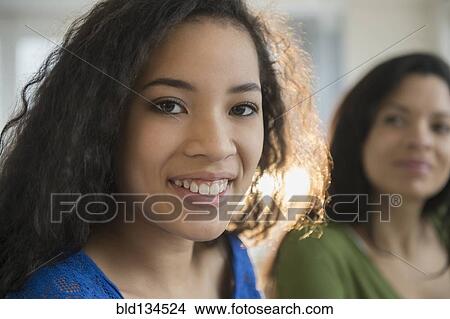 Picture - Teenage girl smiling. Fotosearch
