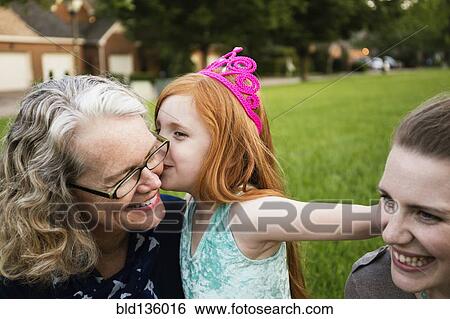 Three generations of Caucasian women sitting in park View Large Photo Image Stock Photograph - Three generations of Caucasian women sitting in park. Fotosearch