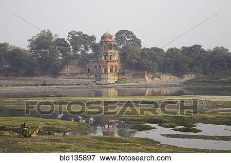 Tower in rural landscape, Agra, India View Large Photo Image Stock Photo - Tower in rural landscape, Agra, India. Fotosearch