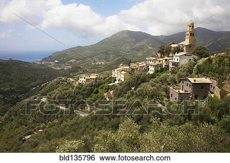 Village on hilltop in rural landscape, Italy, Linguria, Italy, View Large Photo Image Stock Photograph - Village on hilltop in rural landscape, Italy, Linguria, Italy, . Fotosearch