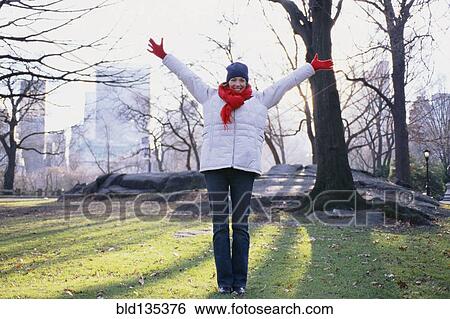 Woman cheering in Central Park, New York City, New York, United States View Large Photo Image Stock Photograph - Woman cheering in Central Park, New York City, New York, United States. Fotosearch