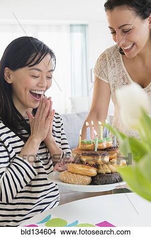 Women celebrating birthday together View Large Photo Image Picture - Women celebrating birthday together. Fotosearch