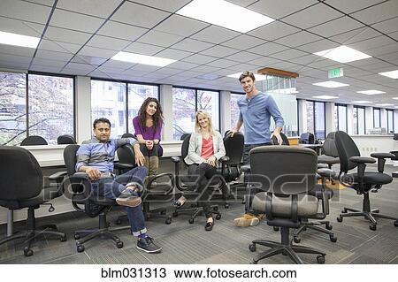 Business people smiling in conference room View Large Photo Image Stock Image - Business people smiling in conference room. Fotosearch