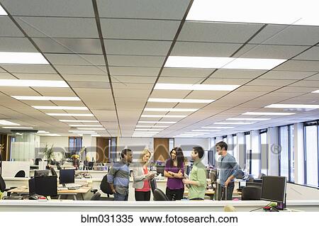 Stock Photography - Business people talking in office. Fotosearch