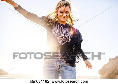 Caucasian girl playing outdoors View Large Photo Image Stock Image - Caucasian girl playing outdoors. Fotosearch