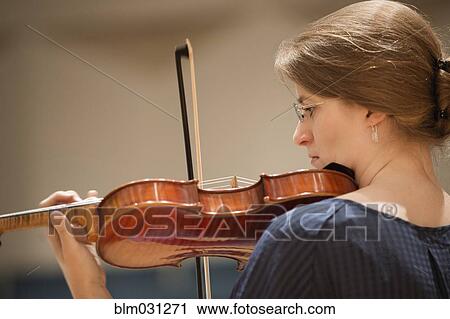 Close up of student playing violin View Large Photo Image Stock Image - Close up of student playing violin. Fotosearch